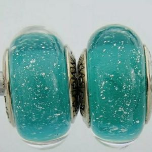 Pandora pair of Disney Ariel's signature Muranos.